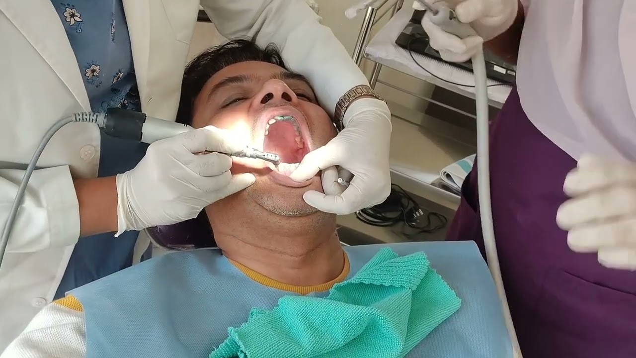 When my Dentist Mumma checks my Daddy's teeth. 