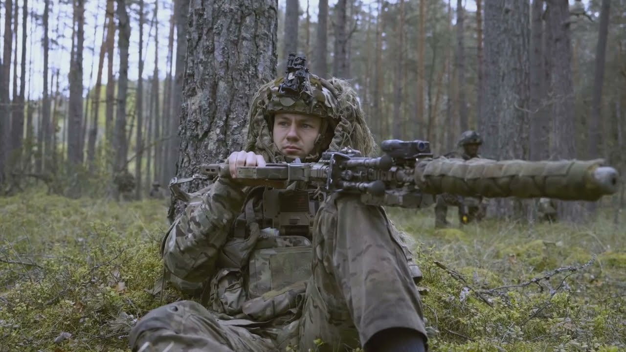 U.S. Paratroopers of the 173rd Airborne Brigade advance in Lithuania