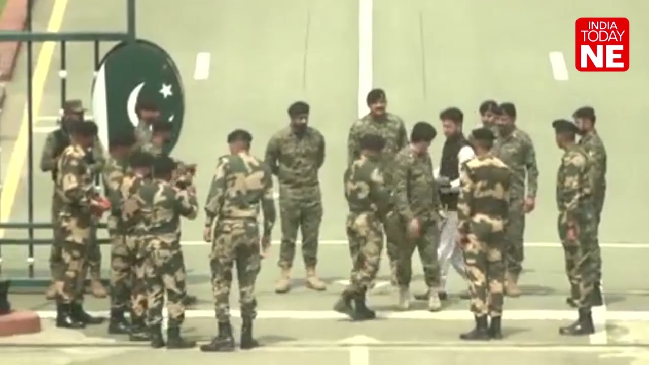 BSF and Pakistan Rangers exchange sweets at Attari-Wagah border on the occasion of Eid al-Adha