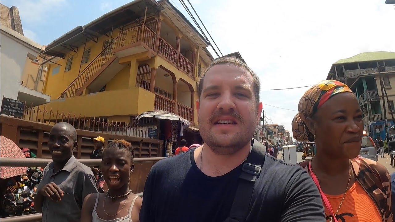 African girl shows me people that need help in Freetown Sierra Leone ￼🇸🇱