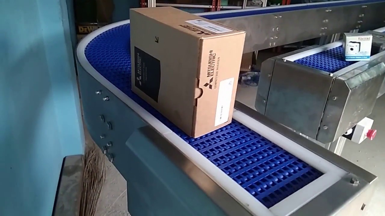 Orange Conveyor Systems - Flexible Modular Belt Curve Conveyor