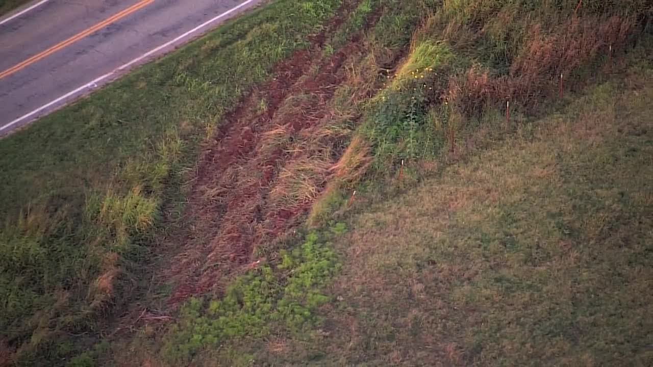 Tracks left behind after school bus carrying Minco softball team crashed off Grady County highway