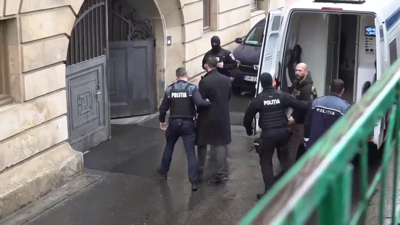 Online influencer Andrew Tate and brother Tristan face Romanian court after UK issues arrest warrant