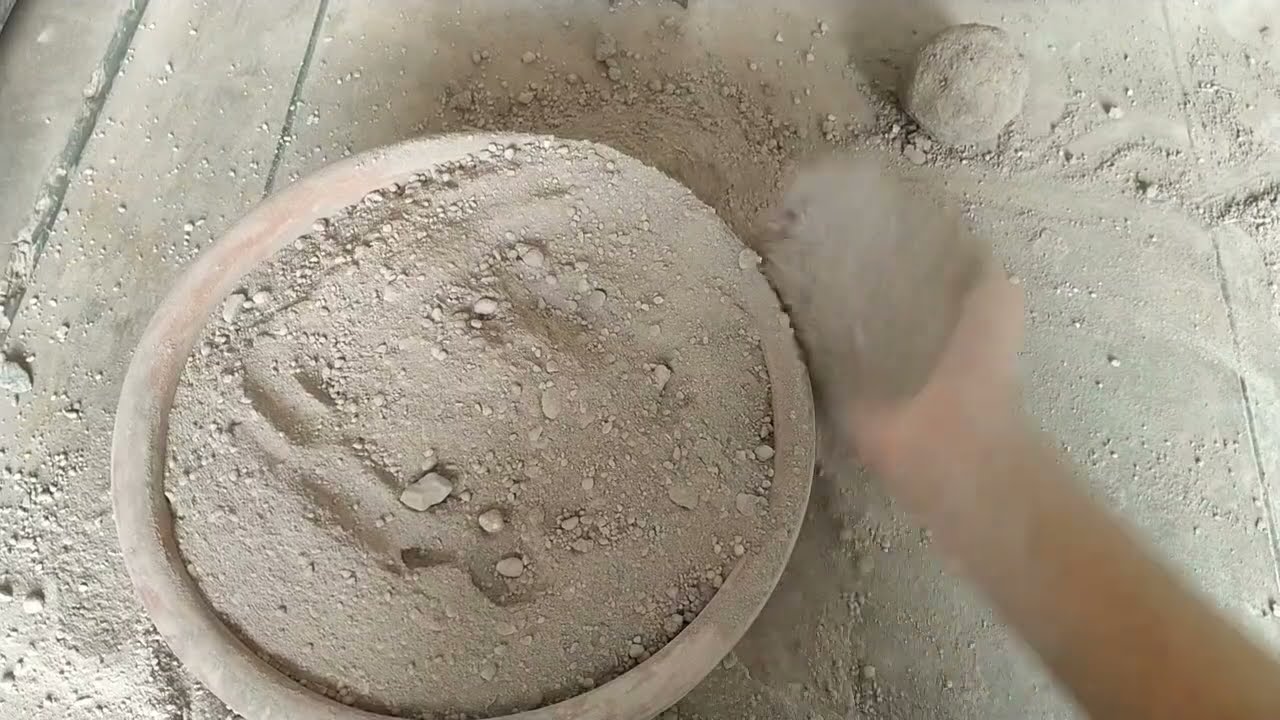 Dusty sand dry crumbling in claypot