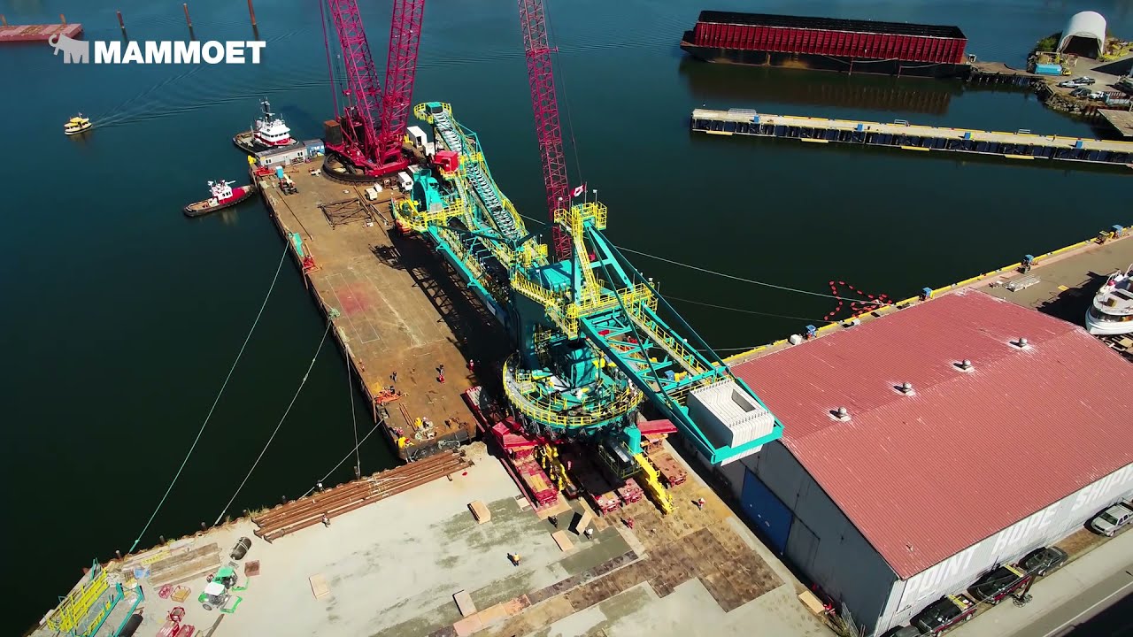 Stacker-reclaimer transport completed cost-effectively