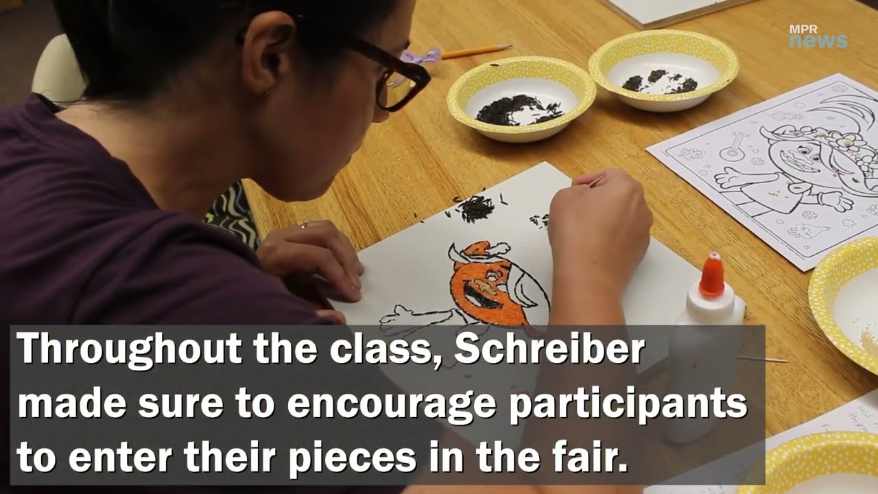 Beginners try their luck at a Minnesota State Fair favorite: crop art