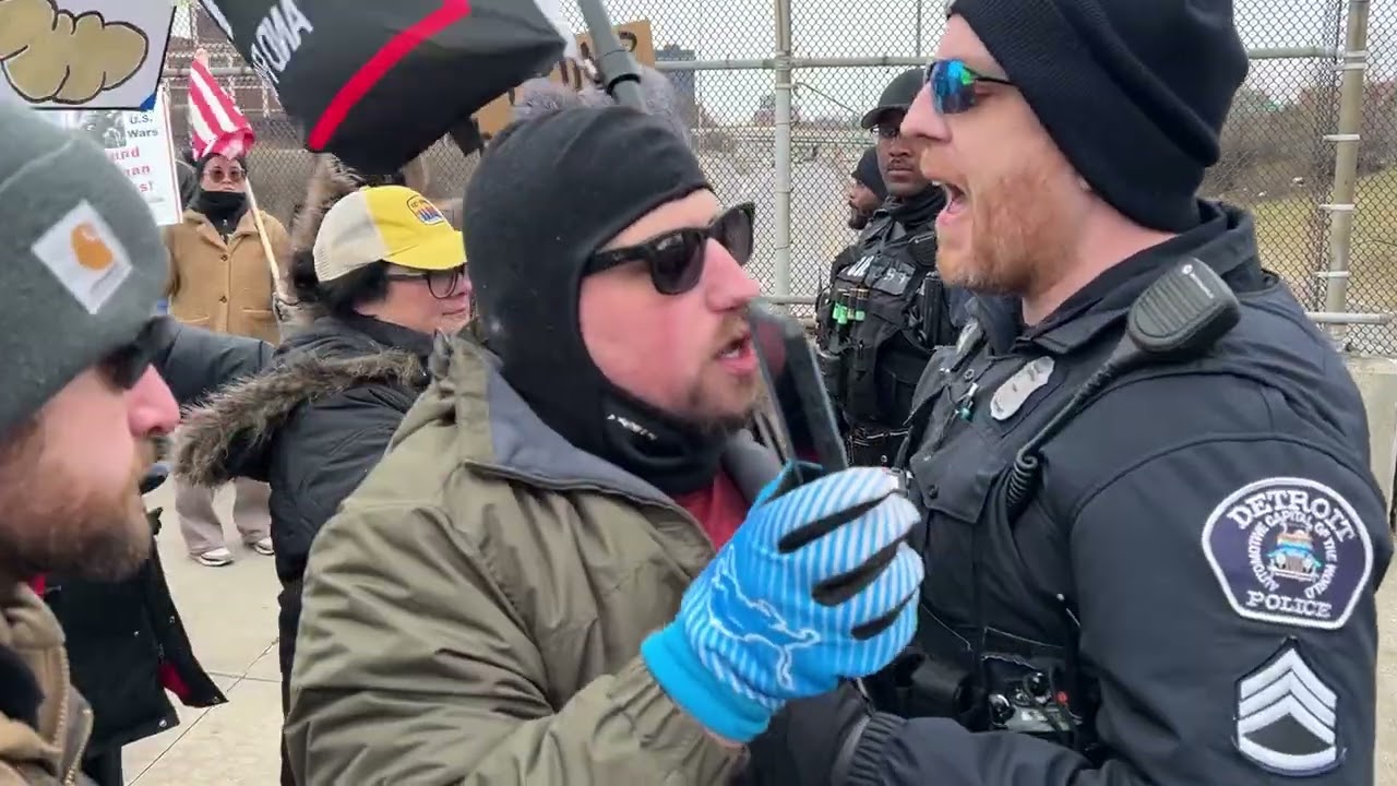 Detroit police take person into custody at protest ahead of Trump visit
