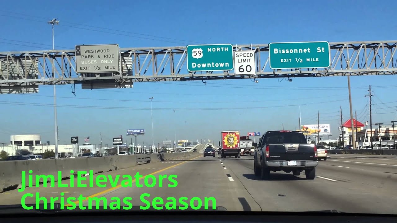 Driving on US-59 Highway going to Downtown Houston, TX.