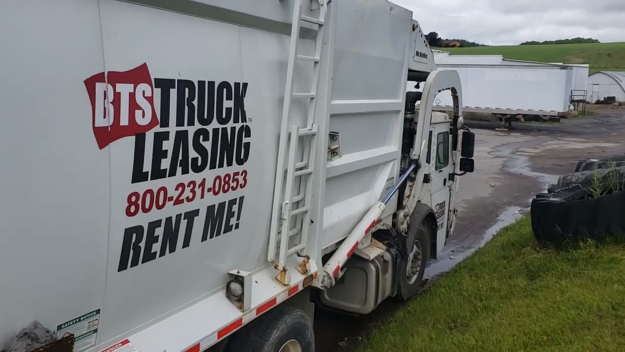 BTS Truck Leasing Mack Mcneilus front loader garbage truck.