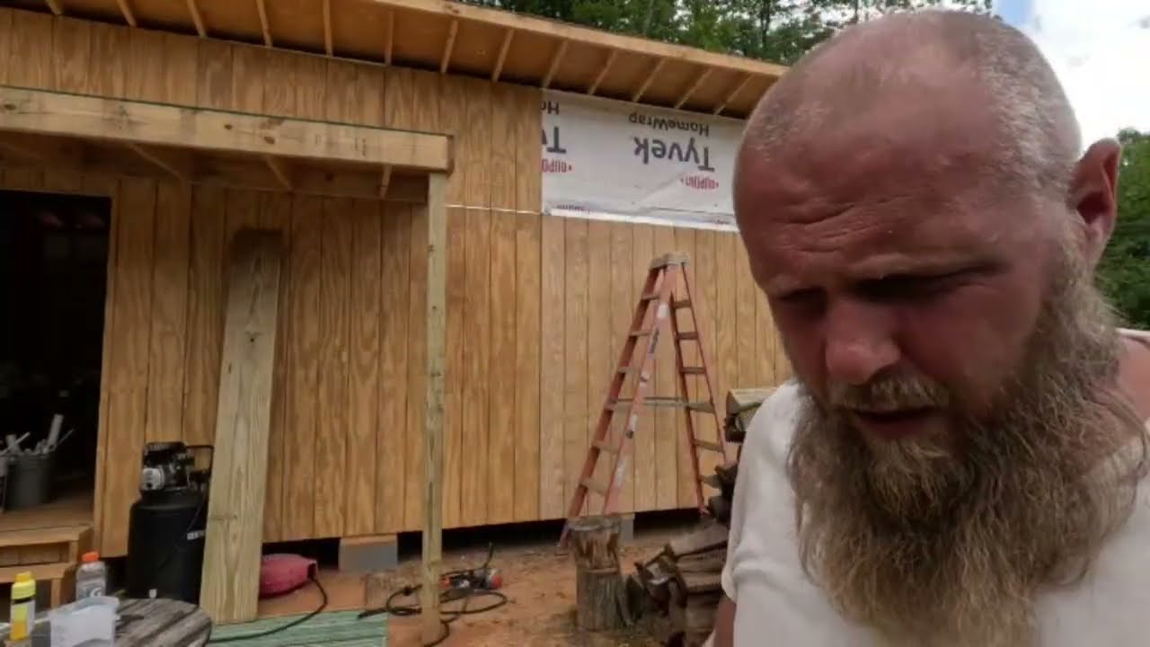 Getting the metal roof on the tiny house, Starting the bathroom.  Under 5K Cabin Build  12x24 Part 6