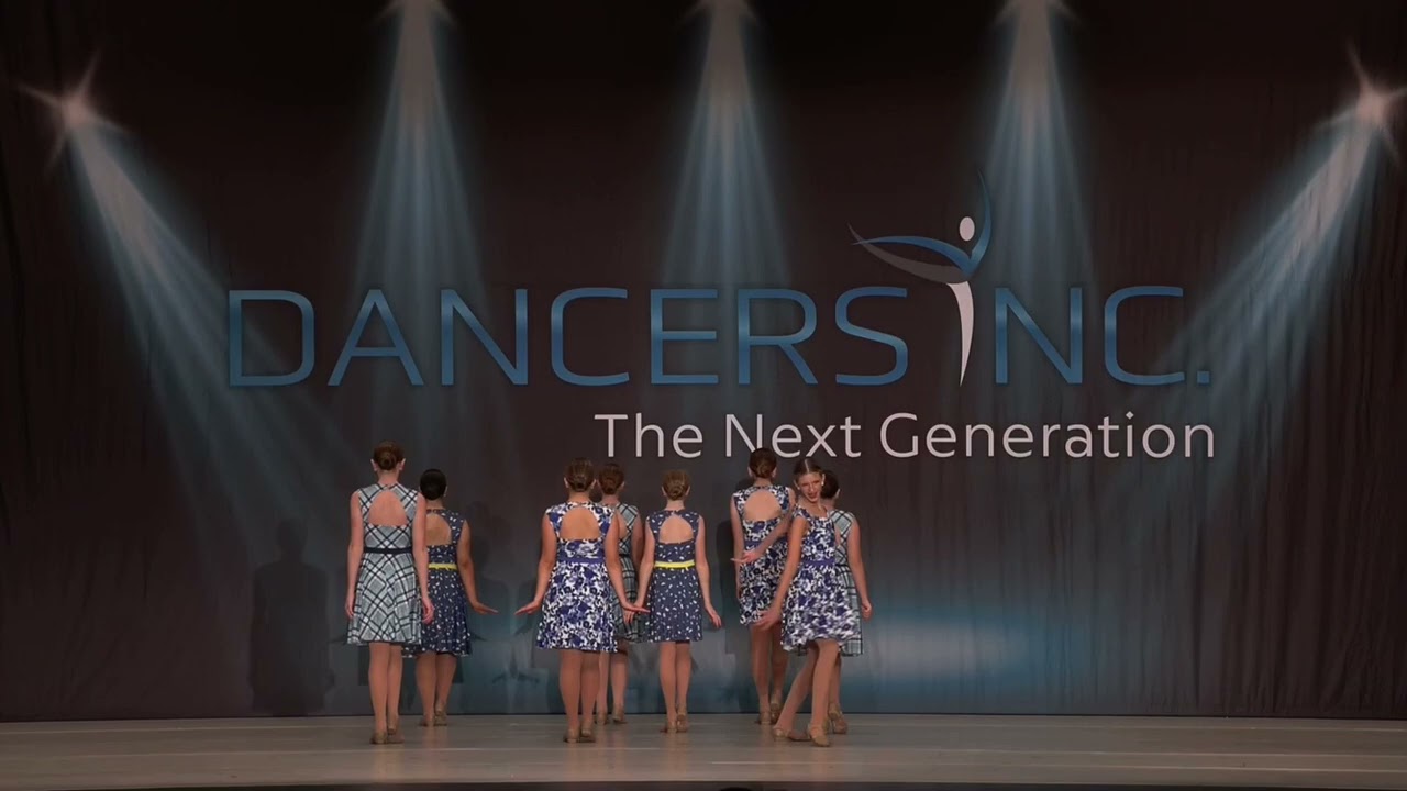 Someone in the crowd.  Dance