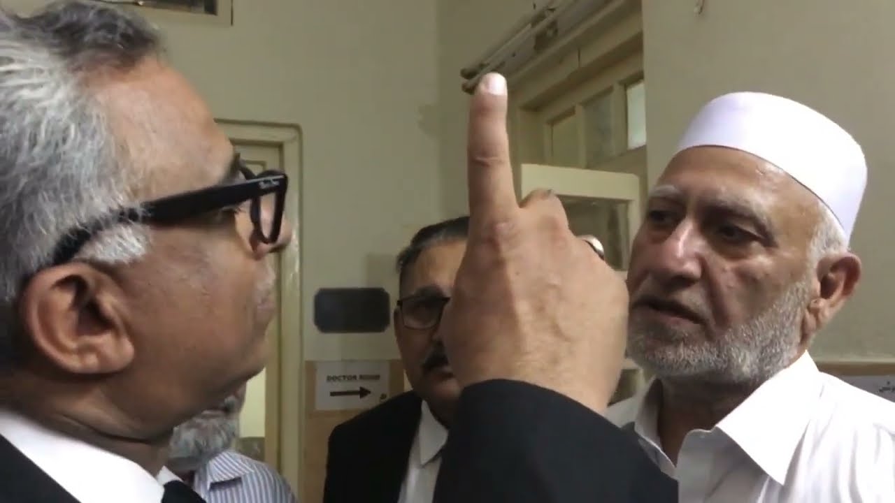 Adv Azhar Siddique is showing compassion to Imran Riaz Khan's father in the court