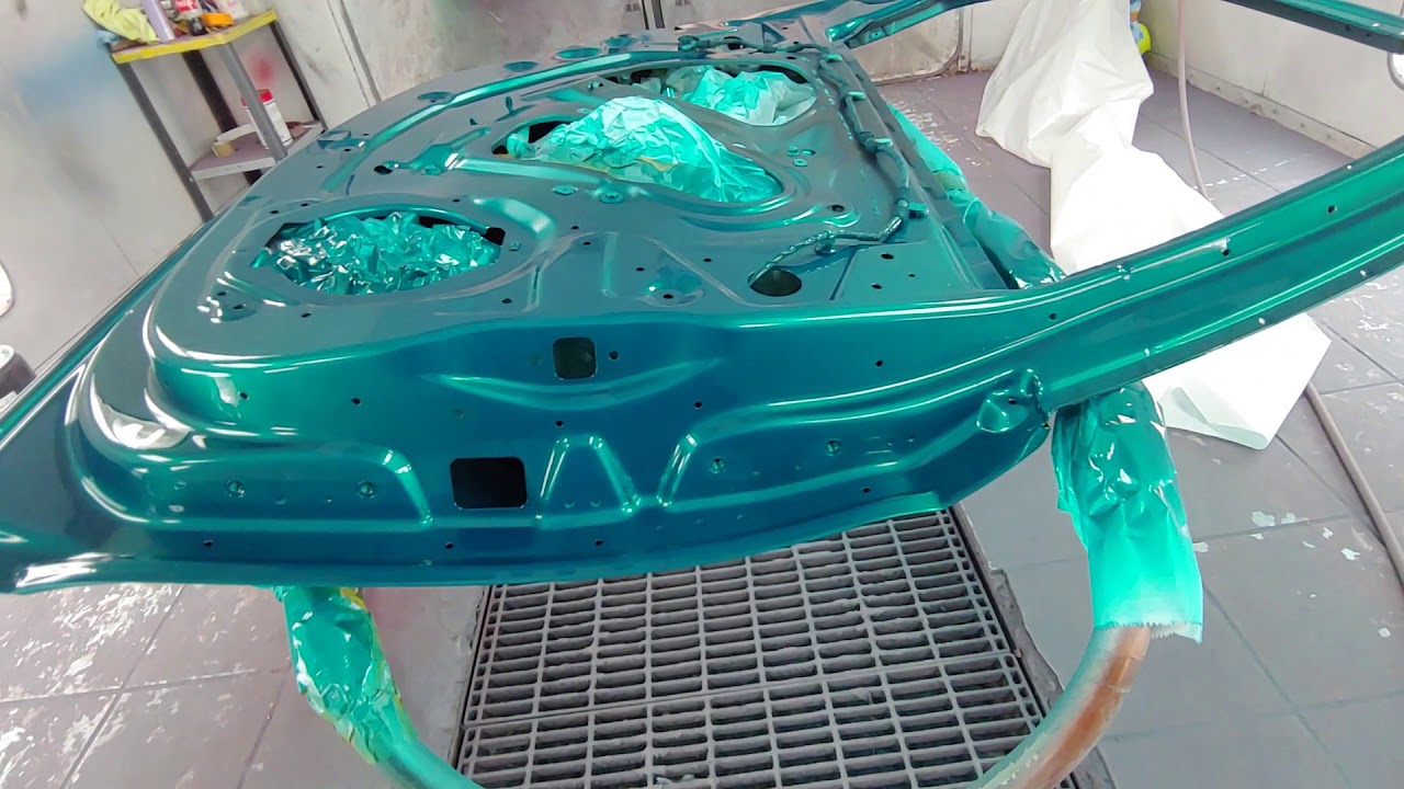 Cadillac Kandy Teal over silver.