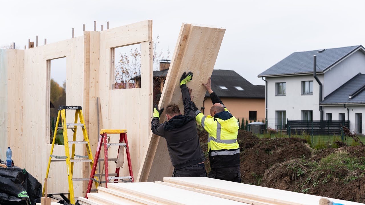 KLIK-KLIK™ Cross Laminated Timber Wall System. Lightweight wall assembly by four people in 24 hours.