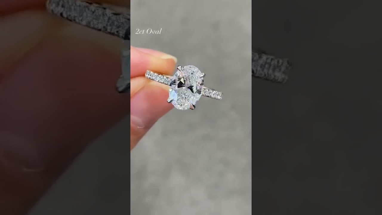2 carat oval diamond engagement with pave set shoulders