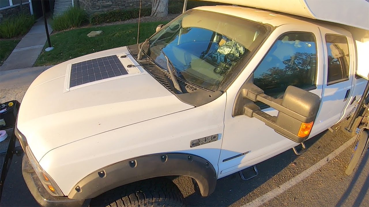 Solar trickle charger installed on hood of my truck