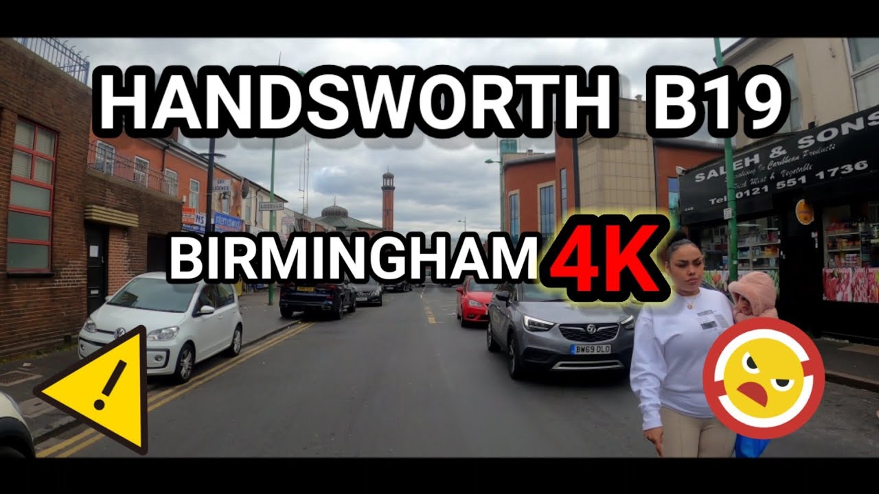 Driving around the highstreet area of Handsworth in Birmingham b21