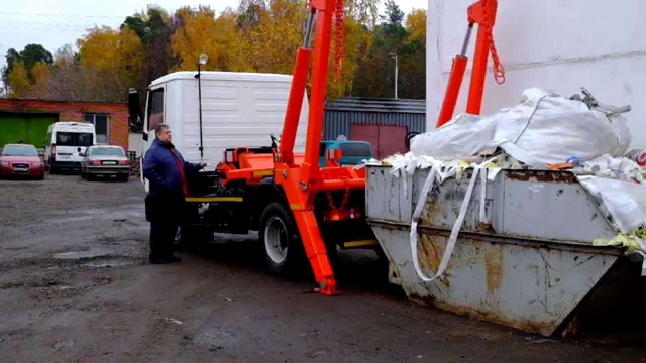 Пример погрузки мусорного контейнера на мусоровоз КО 450 11