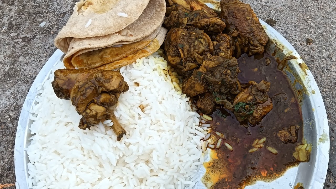 eating hot garam chawal ke sath roti aur chicken leg piece with