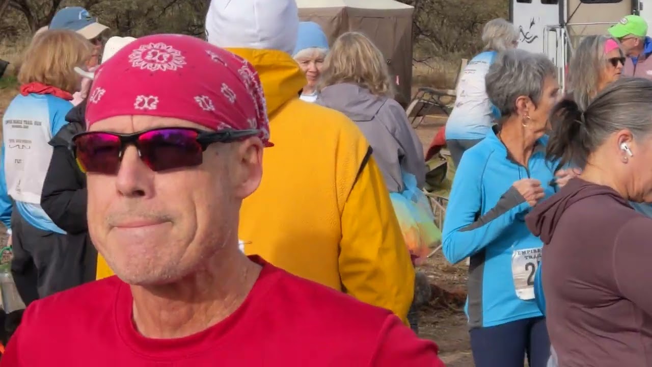 Empire Ranch Inaugural 10K Trail  Race, race director grabs the mic, pan the crowd.