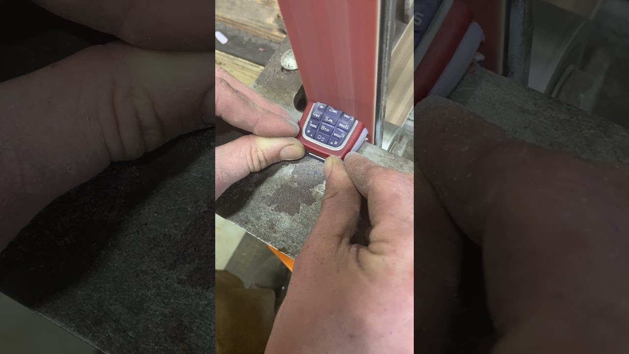 Turning a Nokia 3220 to Dust Using Belt Sander || ViralHog