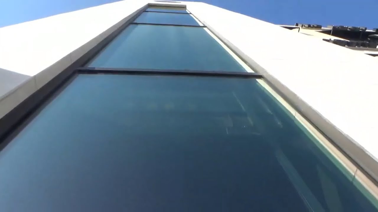 Nice KONE Ecodisc MRL Traction Glass Elevator at Mody Place in Sugar Land TX