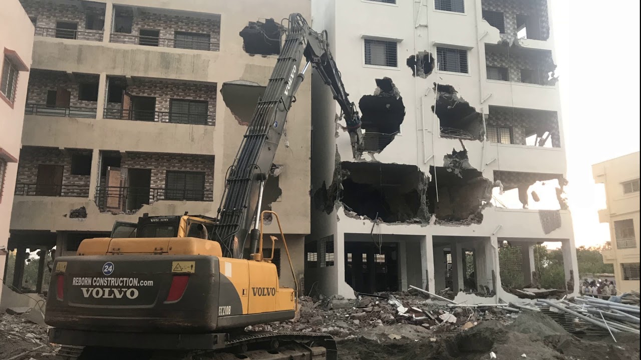 Silent Building Demolition by Jaw Crusher with long Boom