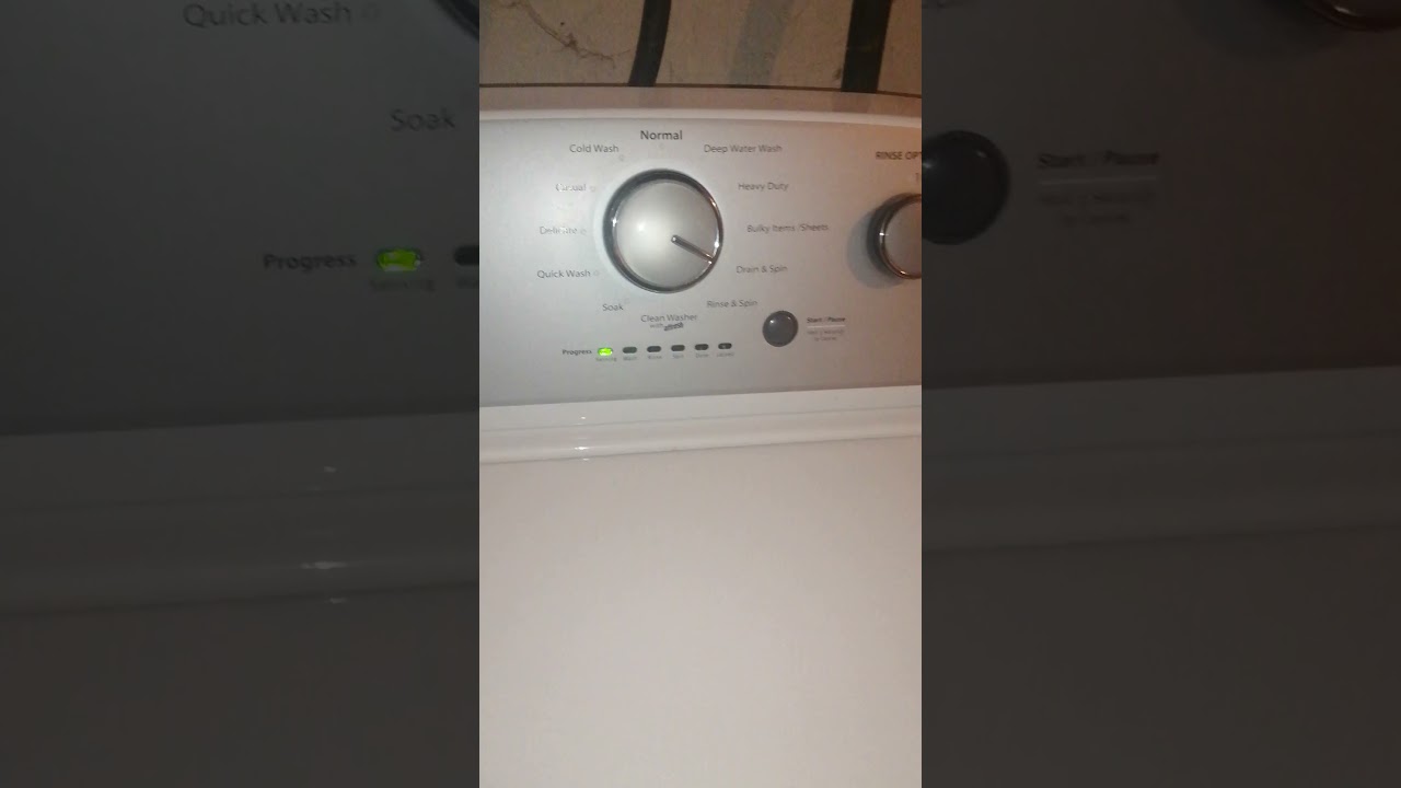 Whirlpool White top-Loader washing-machine drain and spin cycle