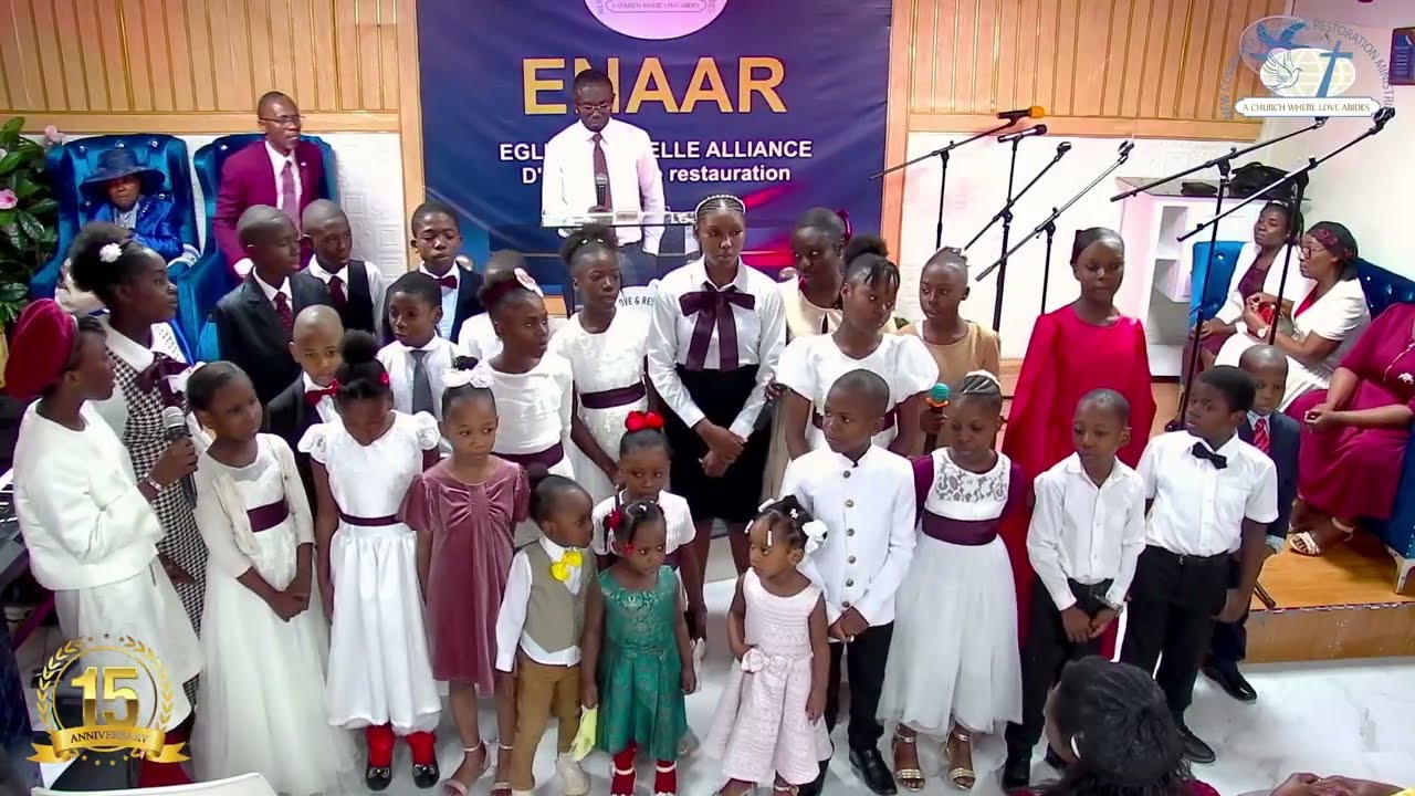 Nous l'aimons car il nous a aimé le premier par les enfants de l'ENAAR.