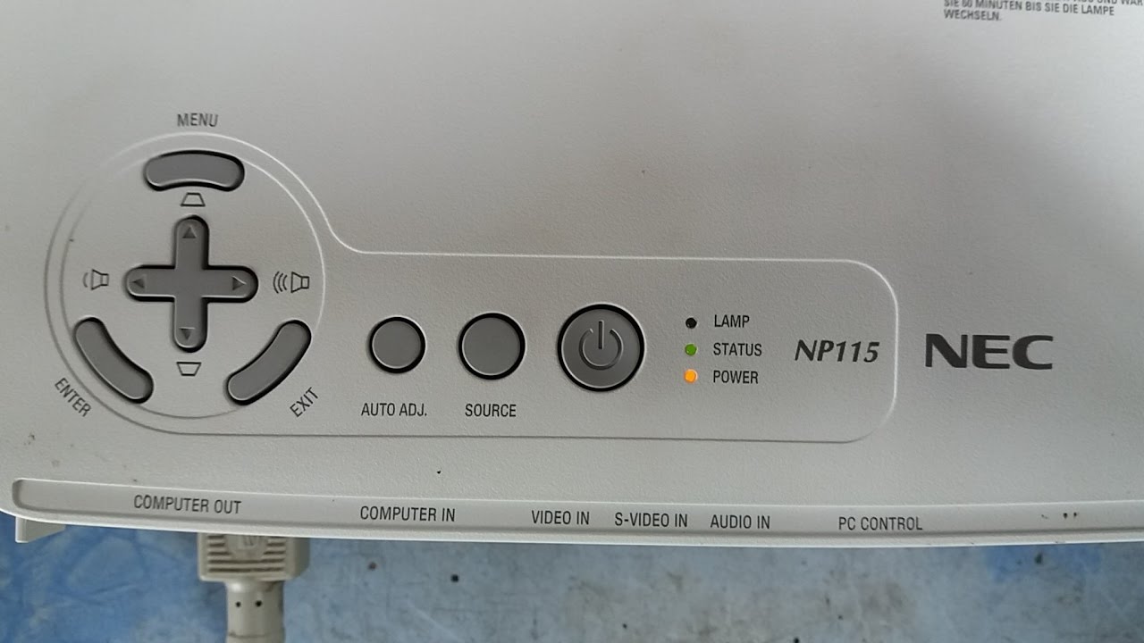 Projetor NP115 com mancha escura, como trocar lente.