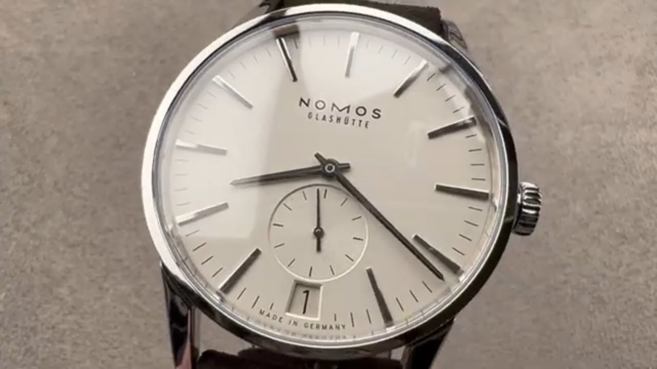 Обзор часов Nomos Glashutte Zurich Date 802.