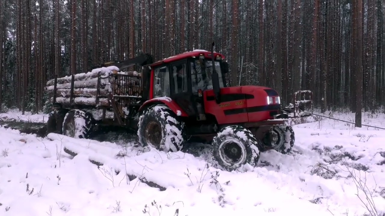 Mtz forest stuck with big home made trailer in winter 2017 #video #logging #forest #stuck