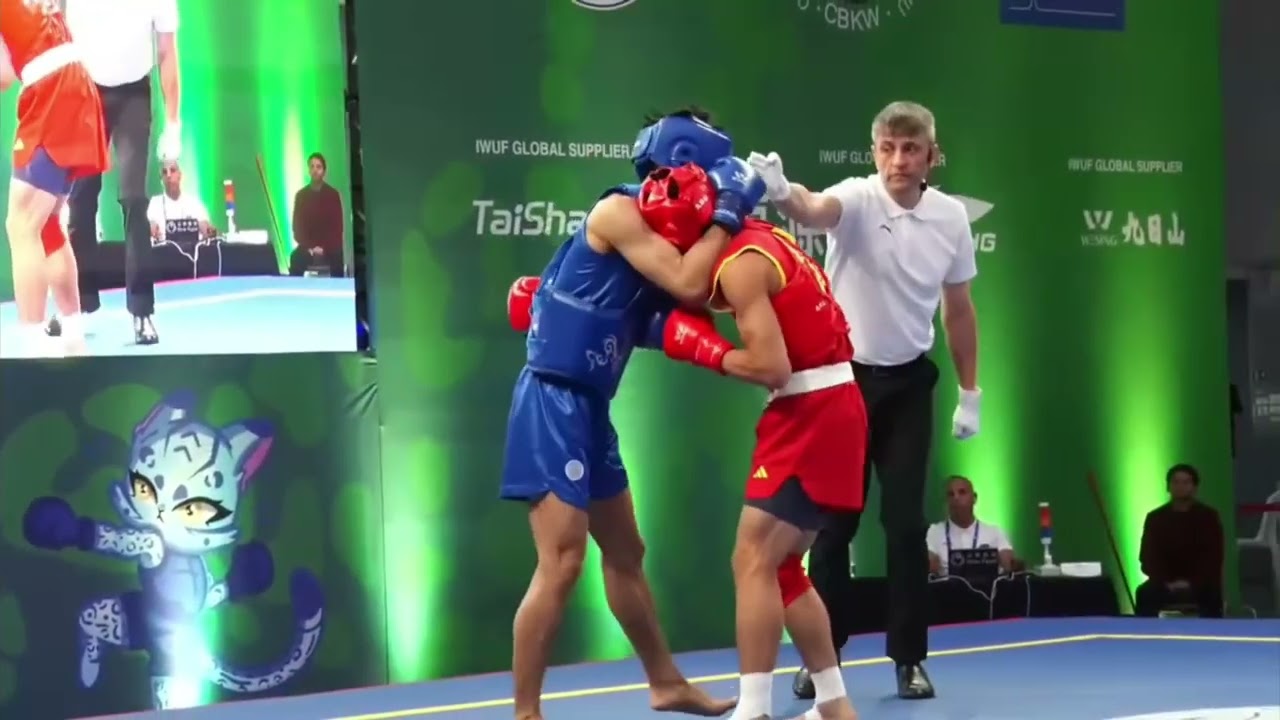 Chengjin Wang (CHN) VS Hia Wing Beh (SGP) - 17th World Wushu Championship Brazil 2025 M-65Kg