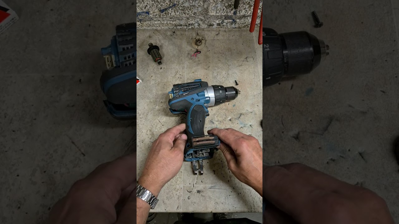 Repairing a Makita DHP458 cordless drill with a burnt out motor.