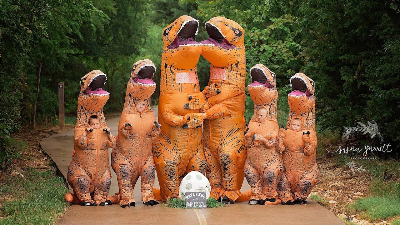 Family of Six Wear Inflatable T-Rex Costume For Pregnancy Announcement
