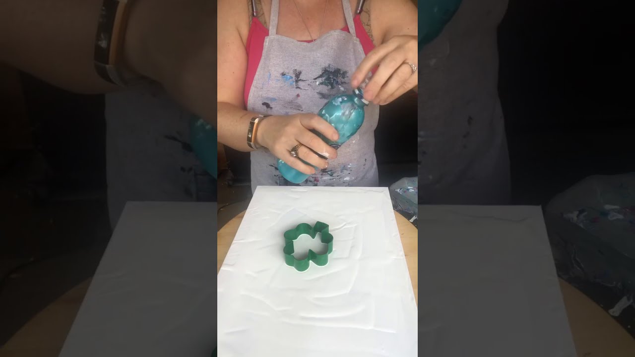 Experimenting with a cookie cutter pour! My paint was too thick !