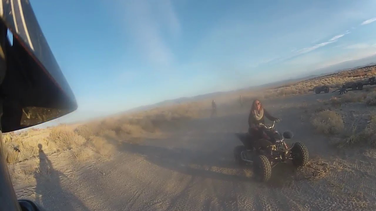 Amy riding the quad