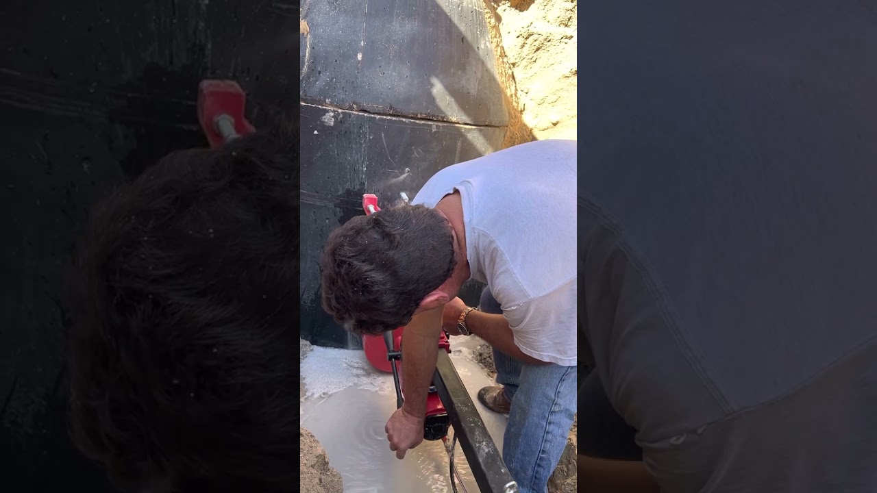 Coring a manhole for tie in 12”