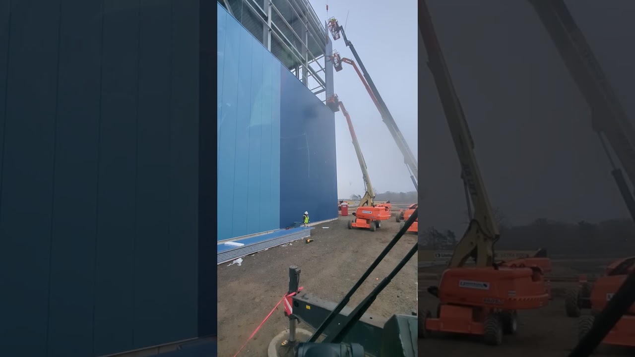 Crane hanging siding in Indiana 