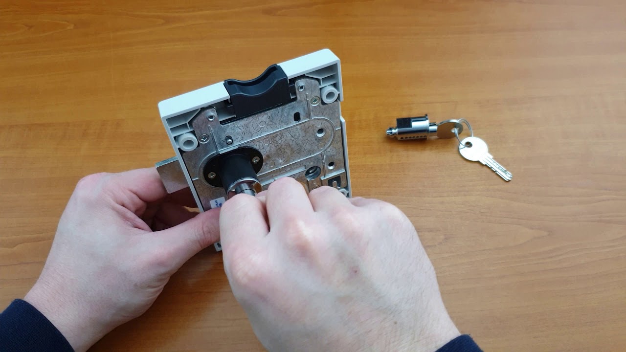 How to remove a cylinder from and Ojmar Coin Return Lock