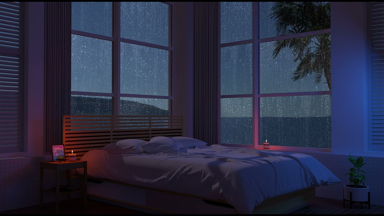 바다가 보이는 조용한 휴양지 침실에서 빗소리를 들으며...,