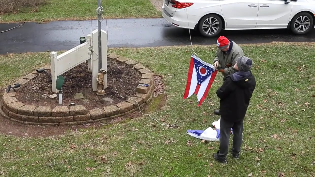 THE FELLAS RAISING THE OHIO FLAG