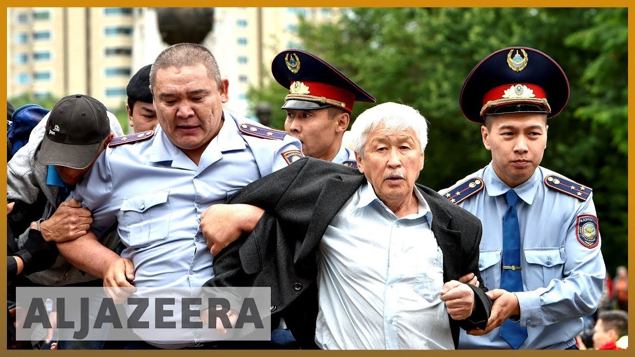 Kazakhstan police and protesters clash after poll