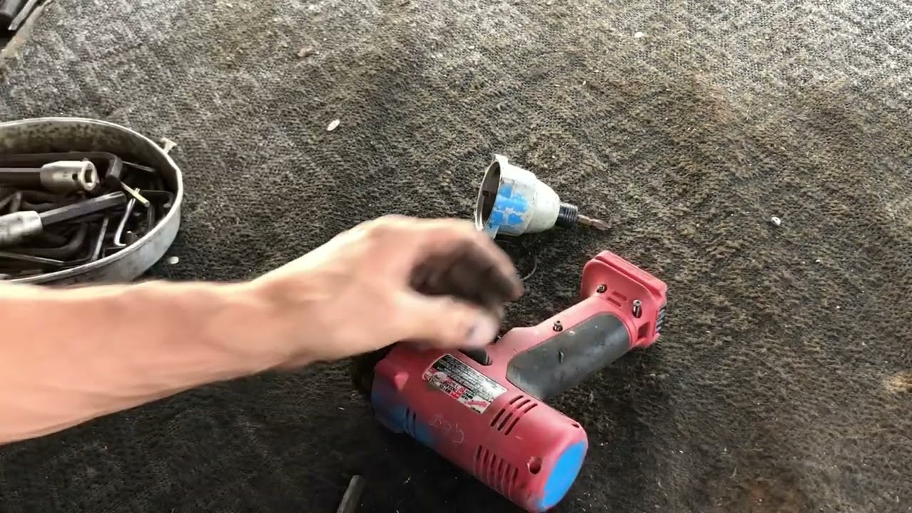 Grumpy old man takes apart a drill for scrap