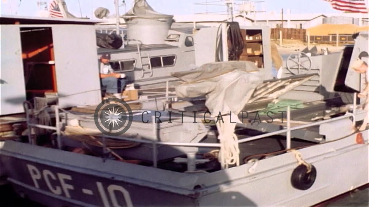 Officer and enlisted man aboard a Swift Boat in An Thoi, Republic of Vietnam. HD Stock Footage