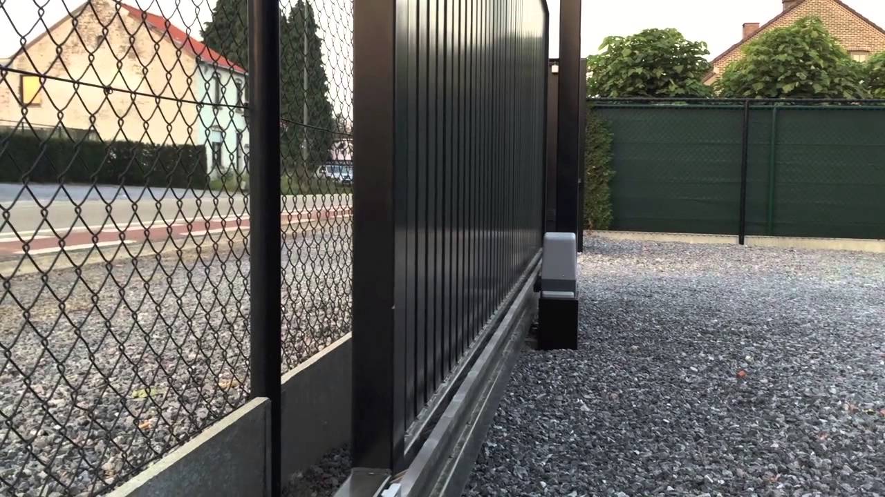 Nijs-Garagepoorten : automatisering vrijdragend schuifhek