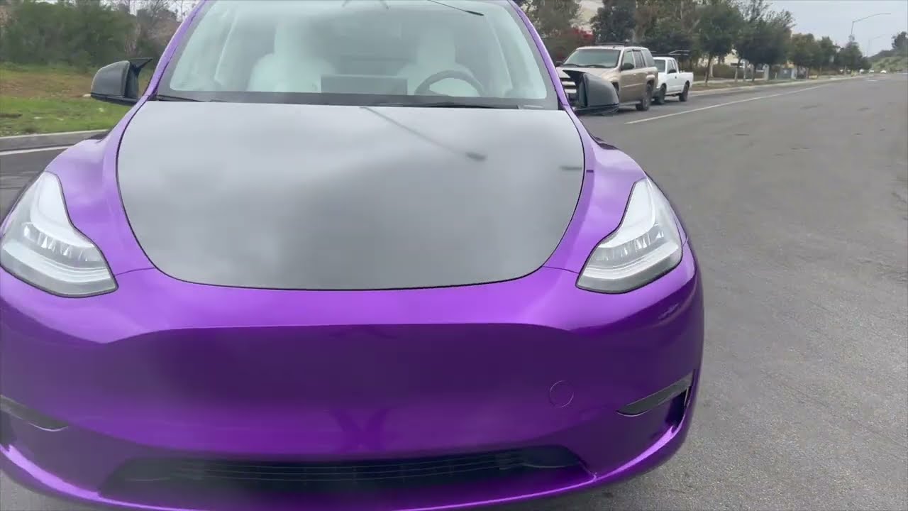 Vvivid Ultra Gloss Candy Purple & Carbon Fiber wrap on Tesla Model Y