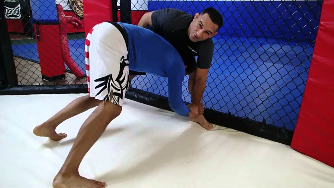 MMA Minute - Takedown defense against the cage