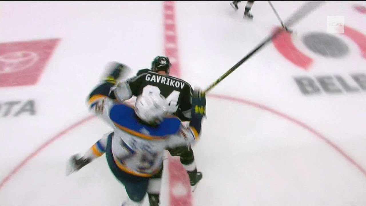 Vladislav Gavrikov with a hit on Sammy Blais in the neutral zone.