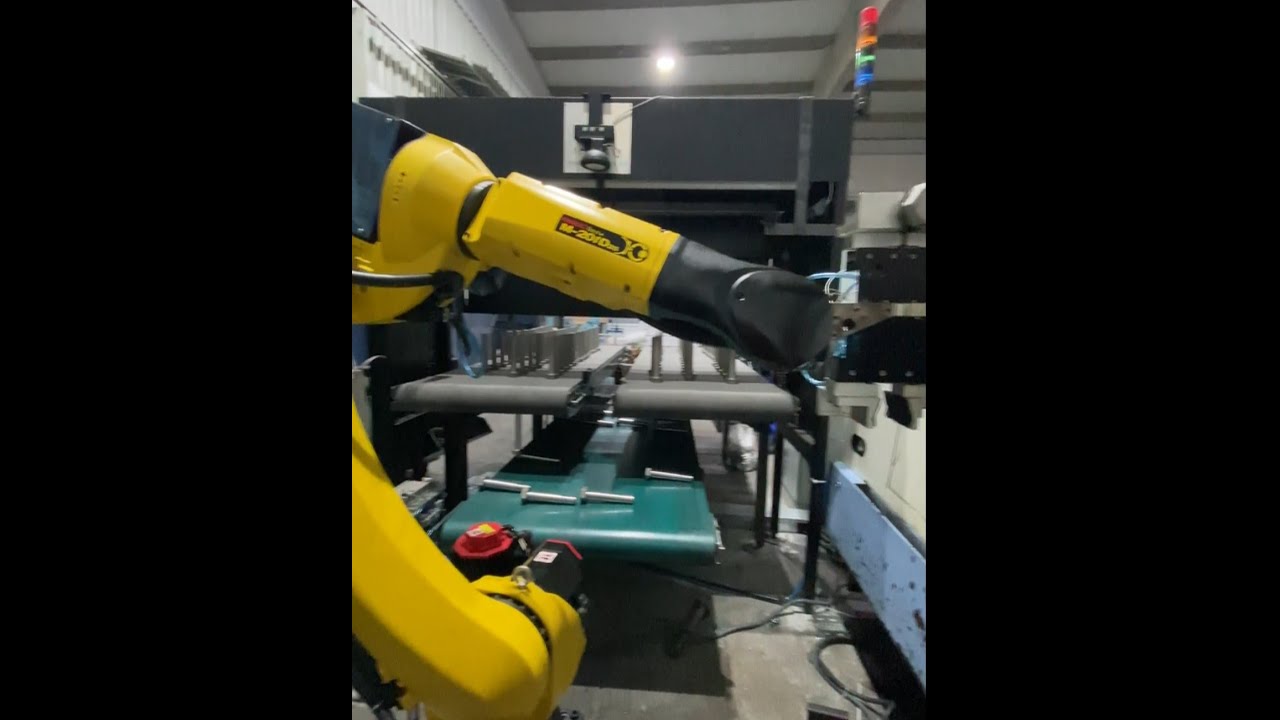 Machine Tending Application to Two Doosan CNC Lathes with Fanuc M20ID/25 Robot & Keyence Camera